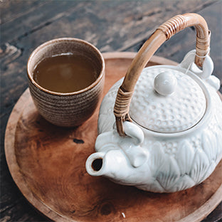 Photo of tea pot and tea. Credit content pixie m on Unsplash